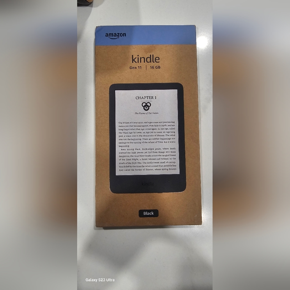 Brand New Amazon Kindle eReader - Black with Blue Accent